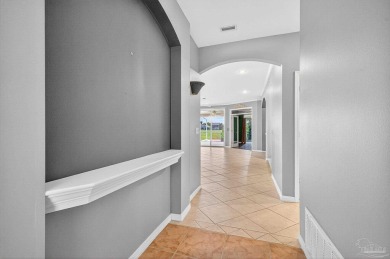 Charming Golf Course Community Home with Canal Views in Tiger on Tiger Point Golf and Country Club in Florida - for sale on GolfHomes.com, golf home, golf lot