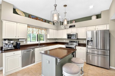 LOCATED ON THE 4TH HOLE IN THE GOLF COURSE COMMUNITY OF on Summerfield Crossing Golf Club in Florida - for sale on GolfHomes.com, golf home, golf lot