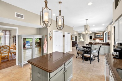 LOCATED ON THE 4TH HOLE IN THE GOLF COURSE COMMUNITY OF on Summerfield Crossing Golf Club in Florida - for sale on GolfHomes.com, golf home, golf lot