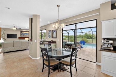 LOCATED ON THE 4TH HOLE IN THE GOLF COURSE COMMUNITY OF on Summerfield Crossing Golf Club in Florida - for sale on GolfHomes.com, golf home, golf lot