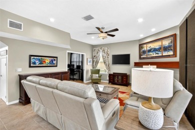 LOCATED ON THE 4TH HOLE IN THE GOLF COURSE COMMUNITY OF on Summerfield Crossing Golf Club in Florida - for sale on GolfHomes.com, golf home, golf lot