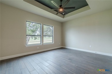 This is THE ONE! This beautiful stucco exterior home with tile on Kissing Tree Golf Club in Texas - for sale on GolfHomes.com, golf home, golf lot