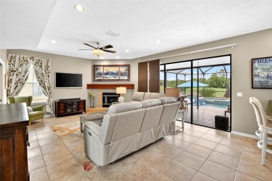 LOCATED ON THE 4TH HOLE IN THE GOLF COURSE COMMUNITY OF on Summerfield Crossing Golf Club in Florida - for sale on GolfHomes.com, golf home, golf lot