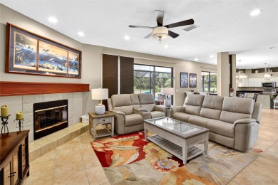 LOCATED ON THE 4TH HOLE IN THE GOLF COURSE COMMUNITY OF on Summerfield Crossing Golf Club in Florida - for sale on GolfHomes.com, golf home, golf lot