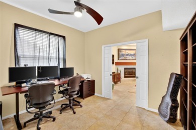 LOCATED ON THE 4TH HOLE IN THE GOLF COURSE COMMUNITY OF on Summerfield Crossing Golf Club in Florida - for sale on GolfHomes.com, golf home, golf lot