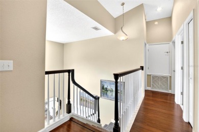 LOCATED ON THE 4TH HOLE IN THE GOLF COURSE COMMUNITY OF on Summerfield Crossing Golf Club in Florida - for sale on GolfHomes.com, golf home, golf lot