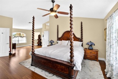 LOCATED ON THE 4TH HOLE IN THE GOLF COURSE COMMUNITY OF on Summerfield Crossing Golf Club in Florida - for sale on GolfHomes.com, golf home, golf lot