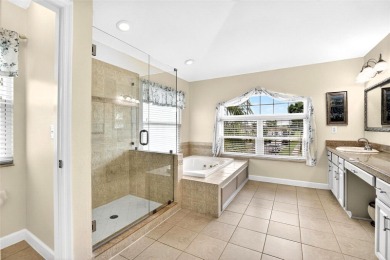 LOCATED ON THE 4TH HOLE IN THE GOLF COURSE COMMUNITY OF on Summerfield Crossing Golf Club in Florida - for sale on GolfHomes.com, golf home, golf lot
