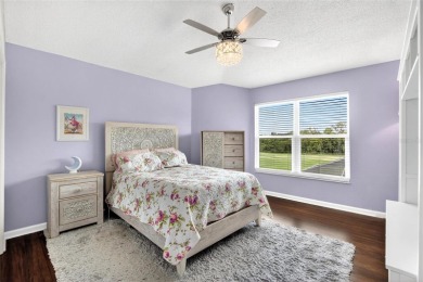 LOCATED ON THE 4TH HOLE IN THE GOLF COURSE COMMUNITY OF on Summerfield Crossing Golf Club in Florida - for sale on GolfHomes.com, golf home, golf lot
