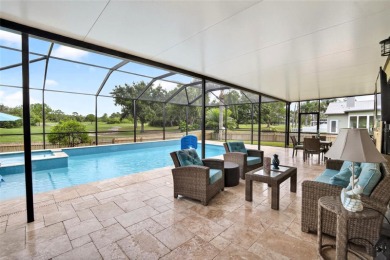 LOCATED ON THE 4TH HOLE IN THE GOLF COURSE COMMUNITY OF on Summerfield Crossing Golf Club in Florida - for sale on GolfHomes.com, golf home, golf lot