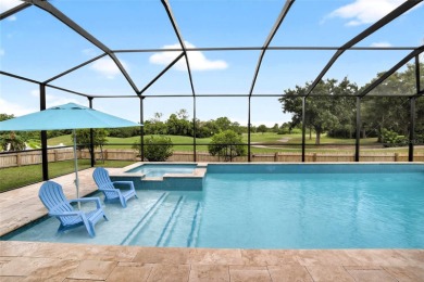 LOCATED ON THE 4TH HOLE IN THE GOLF COURSE COMMUNITY OF on Summerfield Crossing Golf Club in Florida - for sale on GolfHomes.com, golf home, golf lot