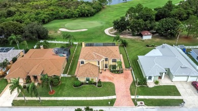 LOCATED ON THE 4TH HOLE IN THE GOLF COURSE COMMUNITY OF on Summerfield Crossing Golf Club in Florida - for sale on GolfHomes.com, golf home, golf lot