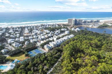 Stunning home just steps from the Gulf in Carillon Beach! This on Sharks Tooth Golf Club in Florida - for sale on GolfHomes.com, golf home, golf lot