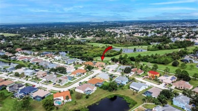 LOCATED ON THE 4TH HOLE IN THE GOLF COURSE COMMUNITY OF on Summerfield Crossing Golf Club in Florida - for sale on GolfHomes.com, golf home, golf lot