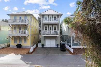 Stunning home just steps from the Gulf in Carillon Beach! This on Sharks Tooth Golf Club in Florida - for sale on GolfHomes.com, golf home, golf lot