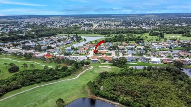 LOCATED ON THE 4TH HOLE IN THE GOLF COURSE COMMUNITY OF on Summerfield Crossing Golf Club in Florida - for sale on GolfHomes.com, golf home, golf lot