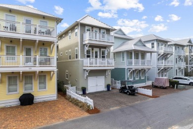 Stunning home just steps from the Gulf in Carillon Beach! This on Sharks Tooth Golf Club in Florida - for sale on GolfHomes.com, golf home, golf lot