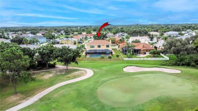 LOCATED ON THE 4TH HOLE IN THE GOLF COURSE COMMUNITY OF on Summerfield Crossing Golf Club in Florida - for sale on GolfHomes.com, golf home, golf lot