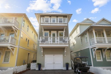 Stunning home just steps from the Gulf in Carillon Beach! This on Sharks Tooth Golf Club in Florida - for sale on GolfHomes.com, golf home, golf lot