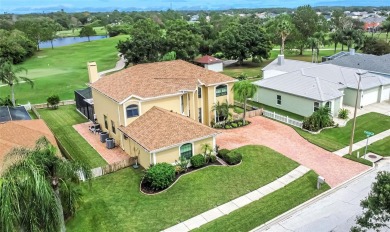 LOCATED ON THE 4TH HOLE IN THE GOLF COURSE COMMUNITY OF on Summerfield Crossing Golf Club in Florida - for sale on GolfHomes.com, golf home, golf lot