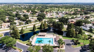 LOCATED ON THE 4TH HOLE IN THE GOLF COURSE COMMUNITY OF on Summerfield Crossing Golf Club in Florida - for sale on GolfHomes.com, golf home, golf lot