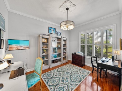 STUNNING CURB APPEAL on this GORGEOUS FULLY REMODELED PANORAMIC on Tampa Bay Golf and Country Club in Florida - for sale on GolfHomes.com, golf home, golf lot