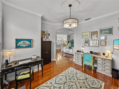 STUNNING CURB APPEAL on this GORGEOUS FULLY REMODELED PANORAMIC on Tampa Bay Golf and Country Club in Florida - for sale on GolfHomes.com, golf home, golf lot