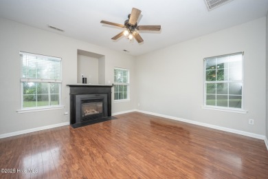 Welcome Home! This beautiful 4-bedroom, 2.5-bath home offers on Eagle Creek Golf Club and Grill in North Carolina - for sale on GolfHomes.com, golf home, golf lot