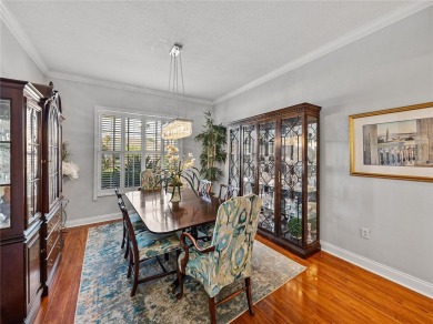 STUNNING CURB APPEAL on this GORGEOUS FULLY REMODELED PANORAMIC on Tampa Bay Golf and Country Club in Florida - for sale on GolfHomes.com, golf home, golf lot