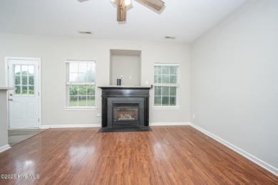 Welcome Home! This beautiful 4-bedroom, 2.5-bath home offers on Eagle Creek Golf Club and Grill in North Carolina - for sale on GolfHomes.com, golf home, golf lot