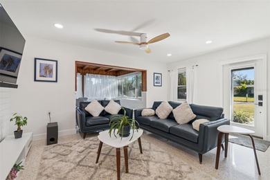 Welcome home to laid-back coastal living in the heart of Dunedin on The Dunedin Country Club in Florida - for sale on GolfHomes.com, golf home, golf lot