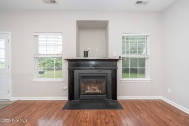 Welcome Home! This beautiful 4-bedroom, 2.5-bath home offers on Eagle Creek Golf Club and Grill in North Carolina - for sale on GolfHomes.com, golf home, golf lot