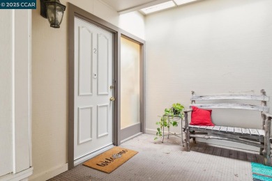 Open Sun 1-4pm. This Sonoma Wrap has 2 bedrooms, 2 bathrooms, in on Rossmoor Golf Course in California - for sale on GolfHomes.com, golf home, golf lot