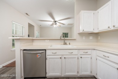 Welcome Home! This beautiful 4-bedroom, 2.5-bath home offers on Eagle Creek Golf Club and Grill in North Carolina - for sale on GolfHomes.com, golf home, golf lot