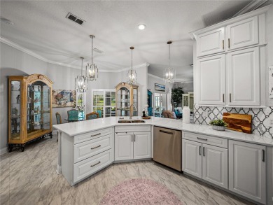 STUNNING CURB APPEAL on this GORGEOUS FULLY REMODELED PANORAMIC on Tampa Bay Golf and Country Club in Florida - for sale on GolfHomes.com, golf home, golf lot