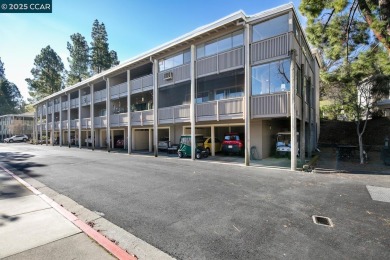 Open Sun 1-4pm. This Sonoma Wrap has 2 bedrooms, 2 bathrooms, in on Rossmoor Golf Course in California - for sale on GolfHomes.com, golf home, golf lot