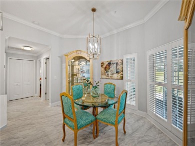 STUNNING CURB APPEAL on this GORGEOUS FULLY REMODELED PANORAMIC on Tampa Bay Golf and Country Club in Florida - for sale on GolfHomes.com, golf home, golf lot