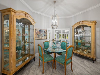 STUNNING CURB APPEAL on this GORGEOUS FULLY REMODELED PANORAMIC on Tampa Bay Golf and Country Club in Florida - for sale on GolfHomes.com, golf home, golf lot