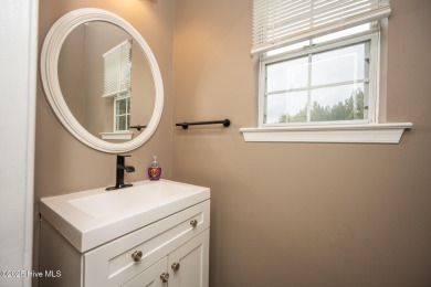 Welcome Home! This beautiful 4-bedroom, 2.5-bath home offers on Eagle Creek Golf Club and Grill in North Carolina - for sale on GolfHomes.com, golf home, golf lot