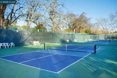Open Sun 1-4pm. This Sonoma Wrap has 2 bedrooms, 2 bathrooms, in on Rossmoor Golf Course in California - for sale on GolfHomes.com, golf home, golf lot