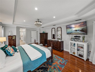 STUNNING CURB APPEAL on this GORGEOUS FULLY REMODELED PANORAMIC on Tampa Bay Golf and Country Club in Florida - for sale on GolfHomes.com, golf home, golf lot