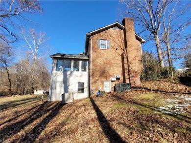 Calling All Renovators! This 2 Story Home in Sedgefield Priced on Sedgefield Golf Course in North Carolina - for sale on GolfHomes.com, golf home, golf lot