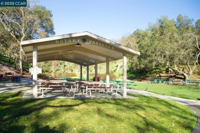 Open Sun 1-4pm. This Sonoma Wrap has 2 bedrooms, 2 bathrooms, in on Rossmoor Golf Course in California - for sale on GolfHomes.com, golf home, golf lot