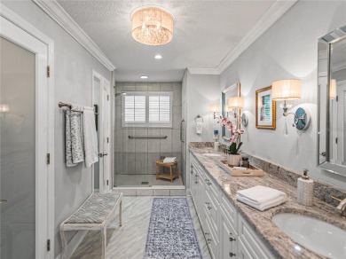STUNNING CURB APPEAL on this GORGEOUS FULLY REMODELED PANORAMIC on Tampa Bay Golf and Country Club in Florida - for sale on GolfHomes.com, golf home, golf lot
