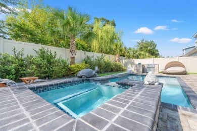 Your dream coastal retreat awaits you! This beautiful 5 bedroom on Surf Golf and Beach Club in South Carolina - for sale on GolfHomes.com, golf home, golf lot