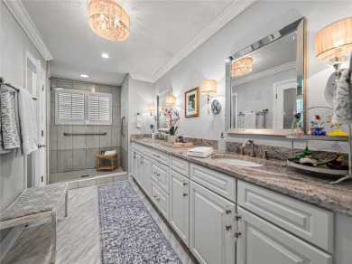 STUNNING CURB APPEAL on this GORGEOUS FULLY REMODELED PANORAMIC on Tampa Bay Golf and Country Club in Florida - for sale on GolfHomes.com, golf home, golf lot
