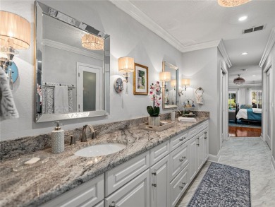STUNNING CURB APPEAL on this GORGEOUS FULLY REMODELED PANORAMIC on Tampa Bay Golf and Country Club in Florida - for sale on GolfHomes.com, golf home, golf lot