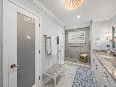 STUNNING CURB APPEAL on this GORGEOUS FULLY REMODELED PANORAMIC on Tampa Bay Golf and Country Club in Florida - for sale on GolfHomes.com, golf home, golf lot
