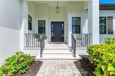Exceptional custom home in the beautiful, gated enclave of on IMG Academies Golf and Country Club in Florida - for sale on GolfHomes.com, golf home, golf lot