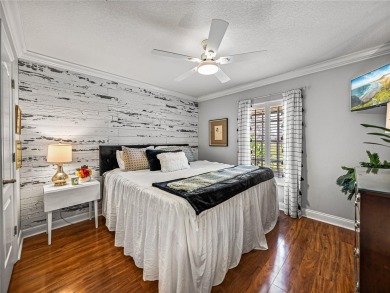 STUNNING CURB APPEAL on this GORGEOUS FULLY REMODELED PANORAMIC on Tampa Bay Golf and Country Club in Florida - for sale on GolfHomes.com, golf home, golf lot